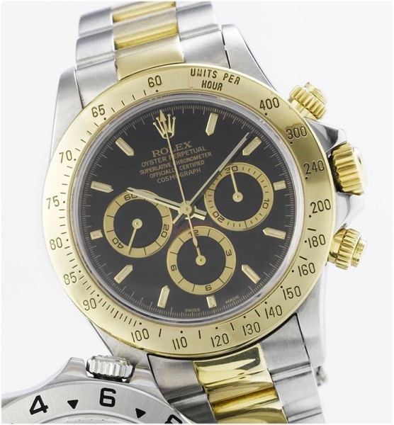 Rolex. A steel and gold automatic centre seconds chronograph wristwatch