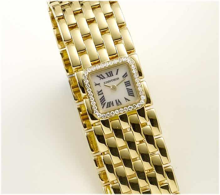 Cartier. A lady's 18ct gold diamond set bracelet watch