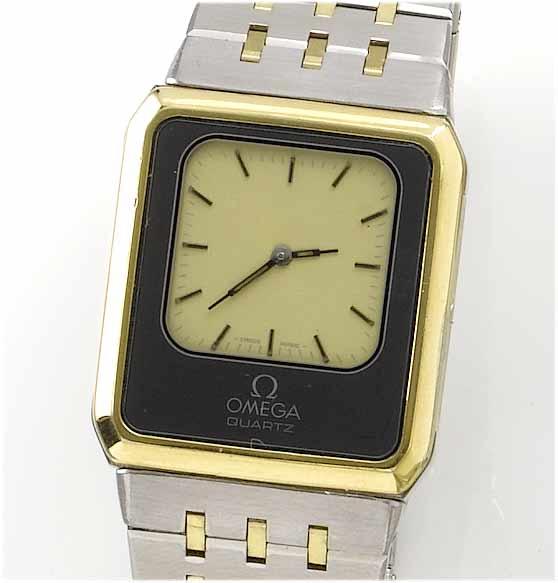 Omega. A gents steel and gilt reversible quartz bracelet watch