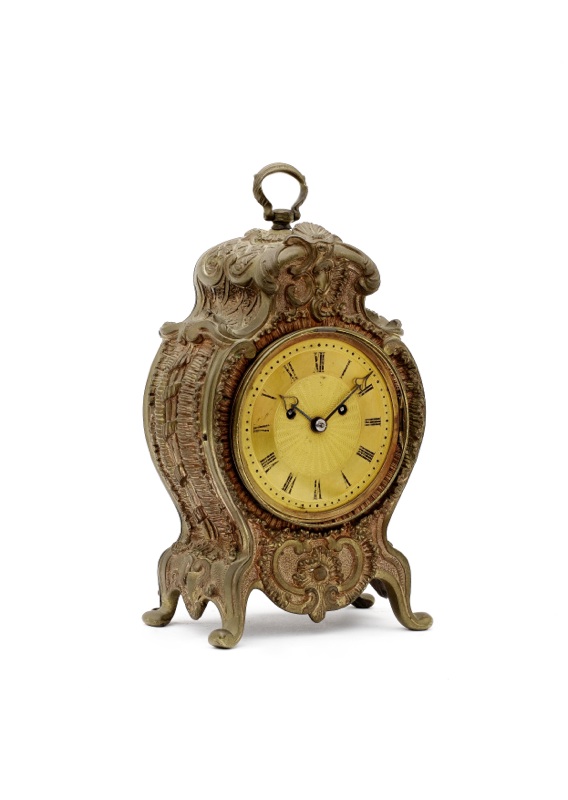 An early 19th century English gilt bronze mantel clock