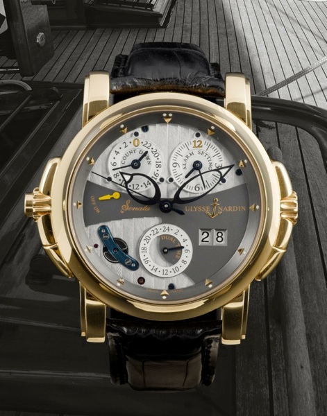 Ulysse Nardin. A fine and very 18ct gold automatic wristwatch with countdown indicator, alarm setting and 24 hour dual time dial