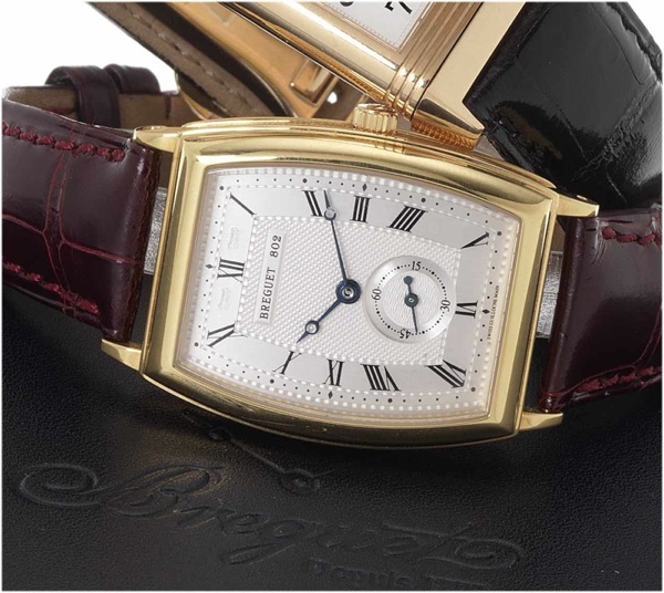 Breguet. A fine and rare 18ct gold wristwatch with fitted presentation box
