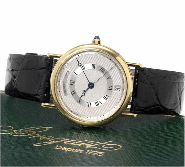 Breguet. A fine 18ct gold centre seconds automatic calendar wristwatch with fitted box and papers