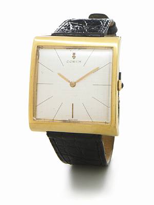 Corum. An unusual oversize 18k gold rectangular wristwatch