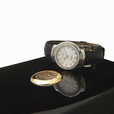 Rolex. An 18k white gold quartz wristwatch with diamond set bezel and dial