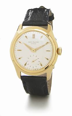Patek Philippe. An unusual 18k gold wristwatch with screw-down reverse