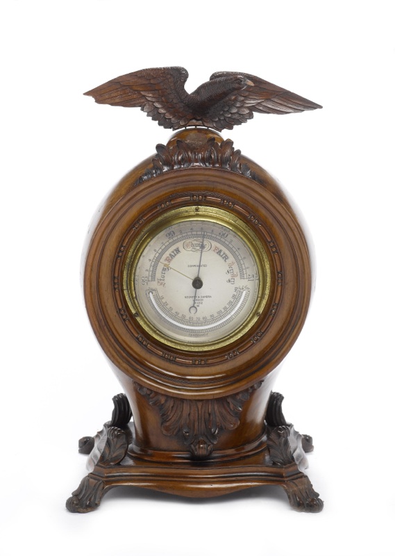 An early 20th century carved propeller with inset barometer