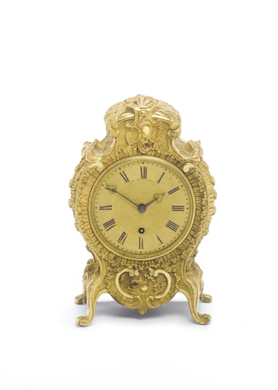 An early 19th century gilt brass mantel timepiece