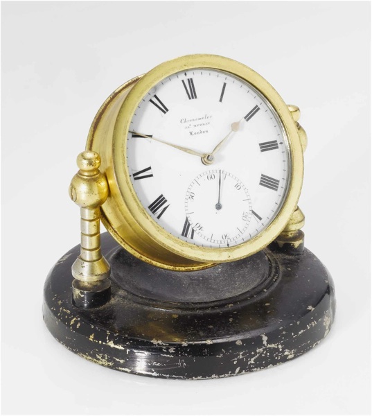 James Murray, London. An early 19th century chronometer pocket watch in a brass stand