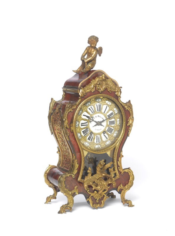 A late 19th century French ormolu mounted tortoiseshell mantel clock made for the Dutch market