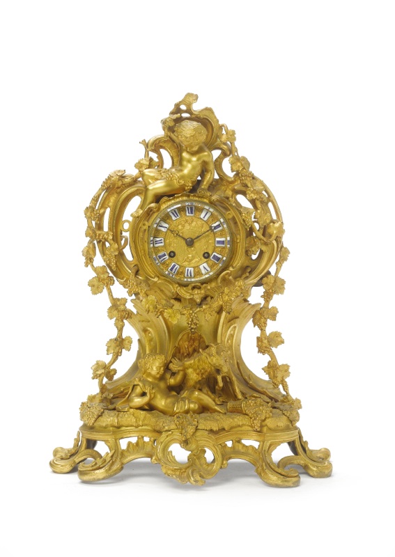 A mid to late 19th century French decorative ormolu mantel clock