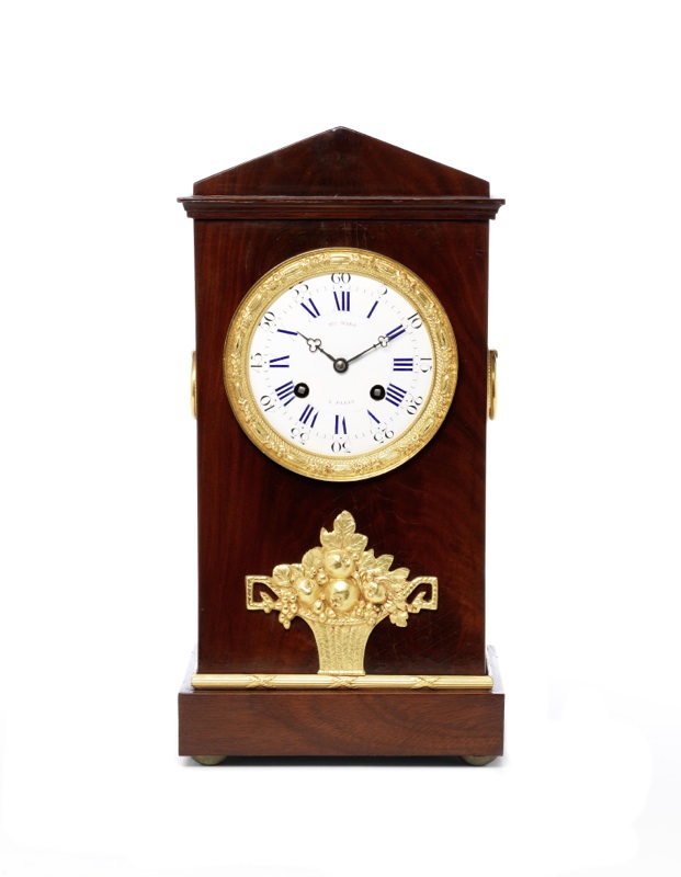 A mid to late 19th century French architectural mahogany mantel clock
