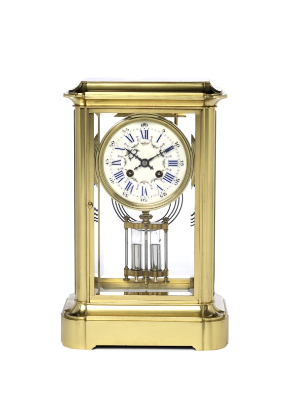 A good late 19th century French four glass mantel clock
