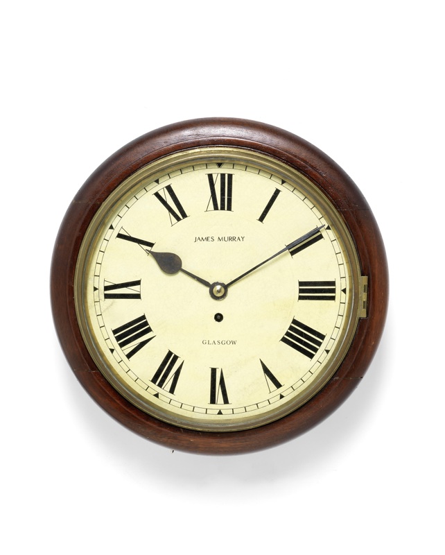 A late 19th century mahogany wall clock