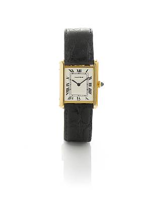 Cartier. An 18k gold rectangular wristwatch