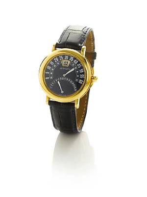 Gerald Genta. A fine 18k gold automatic calendar jump hour with retrograde minutes wristwatch