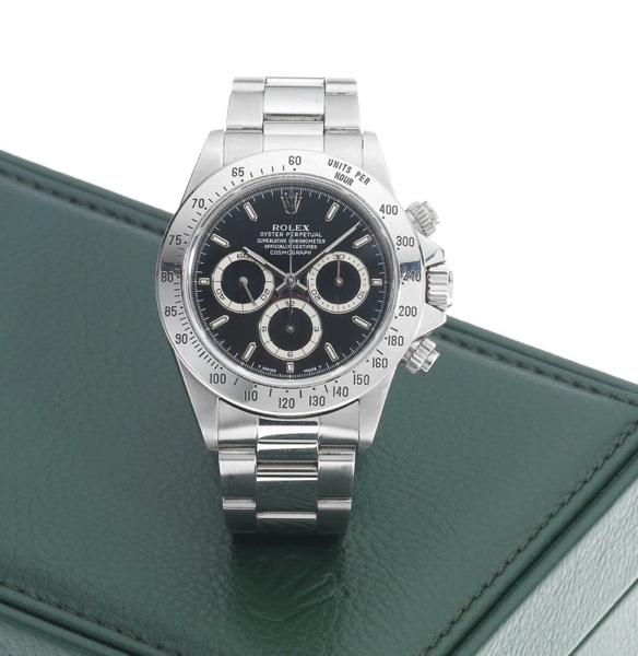 Rolex. A fine and rare stainless steel automatic chronograph bracelet watch together with fitted box