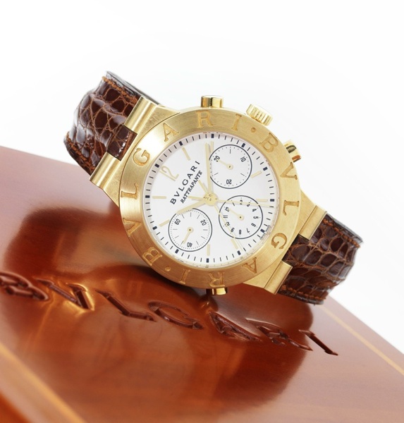 Bulgari. A fine and unusual 18ct gold automatic split second chronograph wristwatch together with fitted presentation box