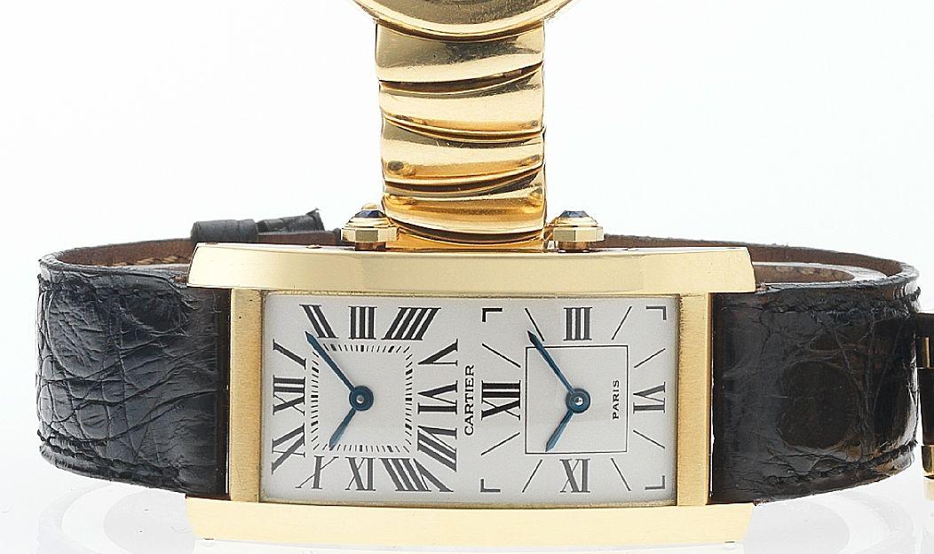 Cartier. A fine 18ct gold dual dial rectangular wristwatch