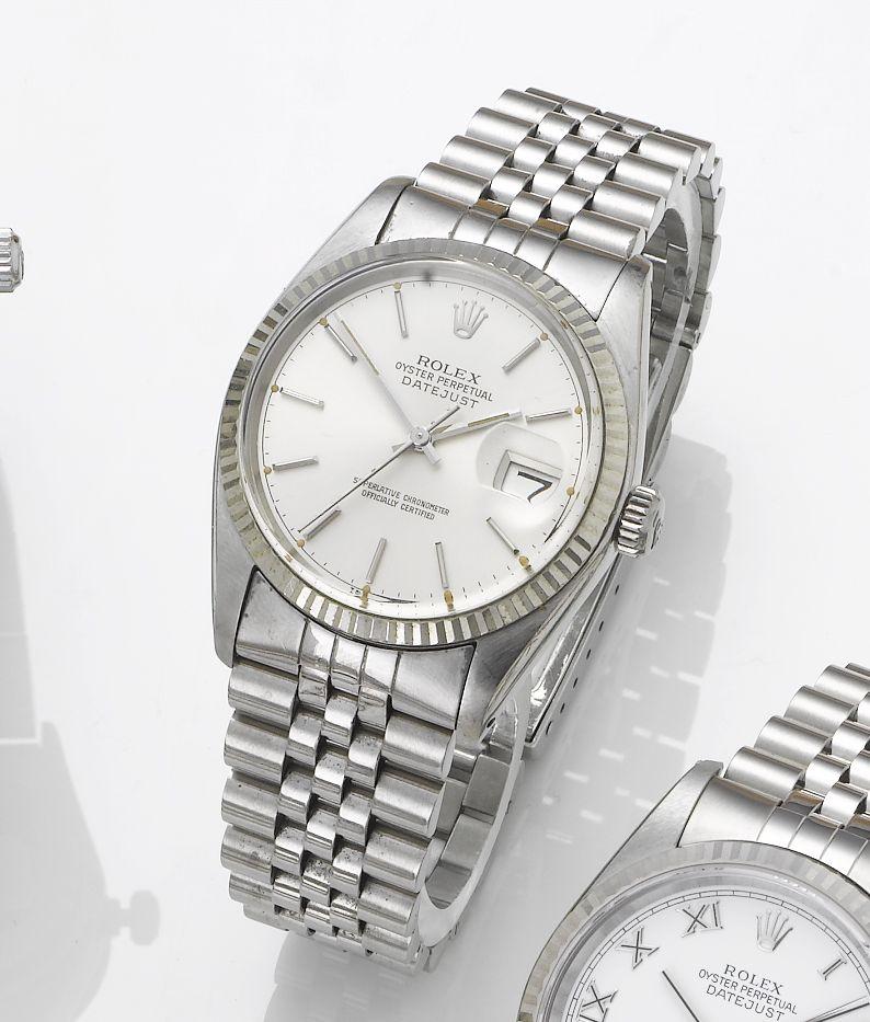 Rolex. A stainless steel automatic centre seconds calendar bracelet watch