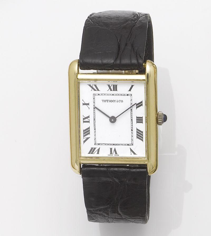Chopard. An 18ct gold rectangular wristwatch retailed by Tiffany Co.
