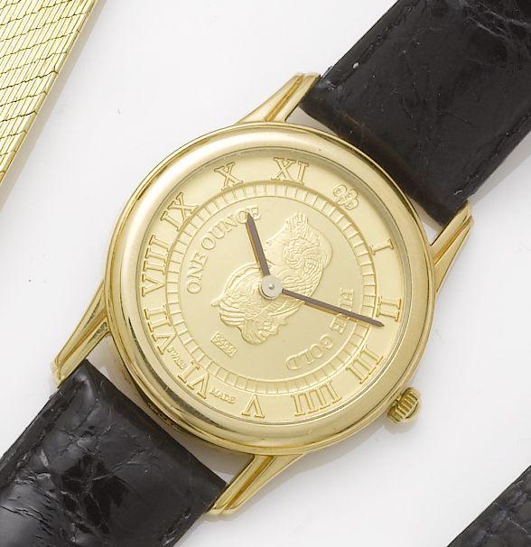PAMP. An 18ct gold wristwatch with one ounce 24ct gold dial