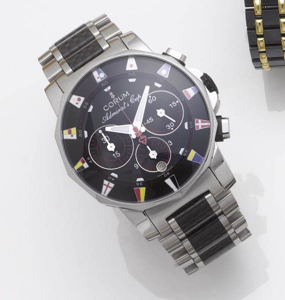 Corum. A fine limited edition stainless steel automatic calendar chronograph bracelet watch together with fitted presentation box