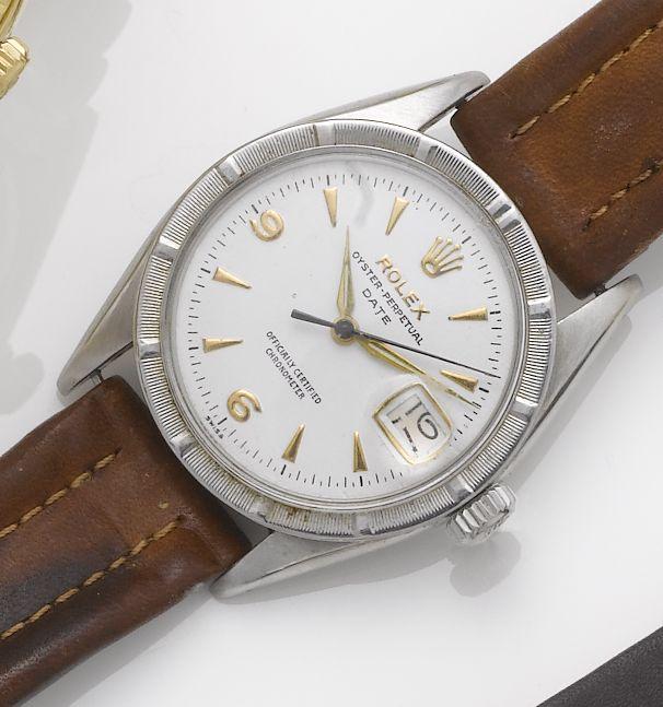Rolex. A stainless steel automatic centre seconds calendar wristwatch