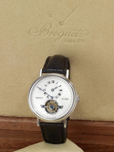 Breguet. A very fine and rare automatic platinum wristwatch with visible one-minute tourbillon regulator, platinum Breguet deployant clasp together with fitted wooden presentation box and Certificate of Origin