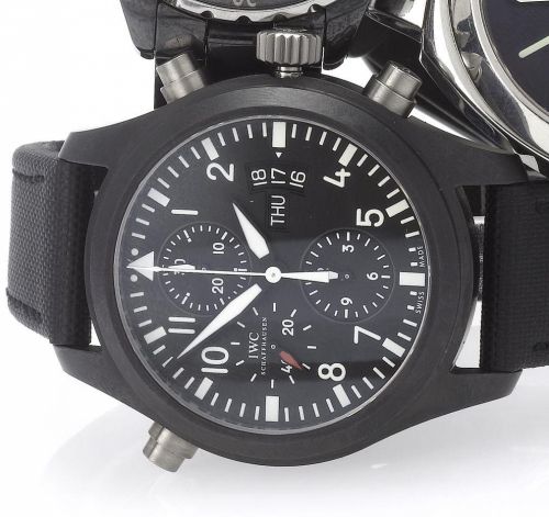 IWC. A large ceramic and titanium limited edition automatic split seconds pilot's chronograph wristwatch with day and date
