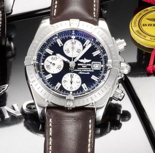 Breitling. A fine stainless steel automatic chronograph calendar wristwatch together with fitted box and papers