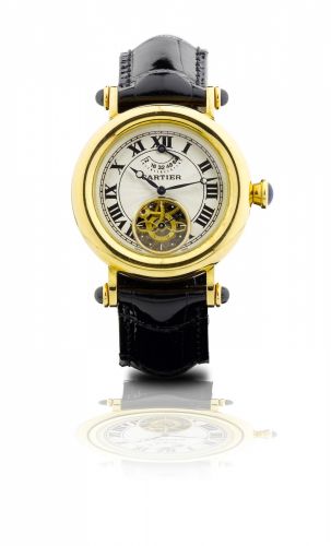 Cartier. A very fine and rare 18ct gold automatic skeletonized tourbillon wristwatch with power reserve display