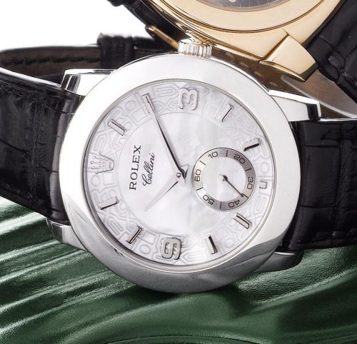 Rolex. A fine and rare platinum manual wind wristwatch with fitted box and papers