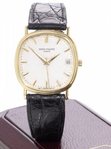Patek Philippe. A fine 18ct gold automatic centre seconds calendar wristwatch with fitted box