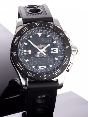 Breitling. A stainless steel quartz calendar chronograph digital display wristwatch