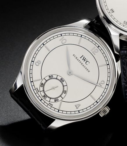IWC. A very fine platinum oversized wristwatch together with presentation box and papers