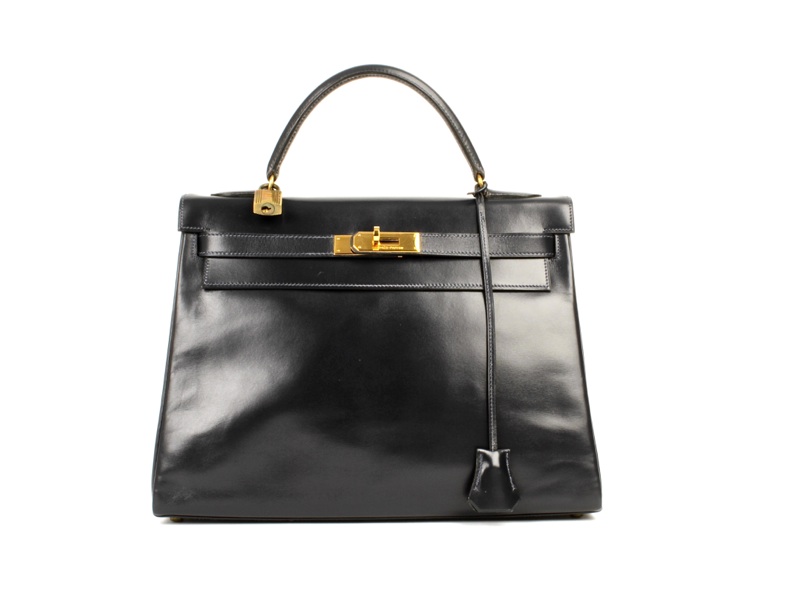 An Hermès navy leather Kelly bag, 1985