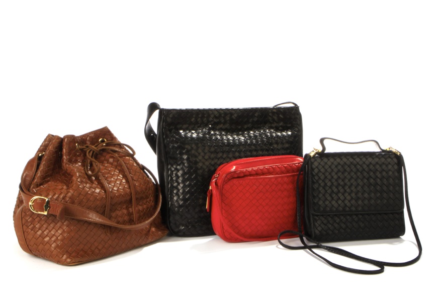 Three Charles Jourdan woven leather handbags