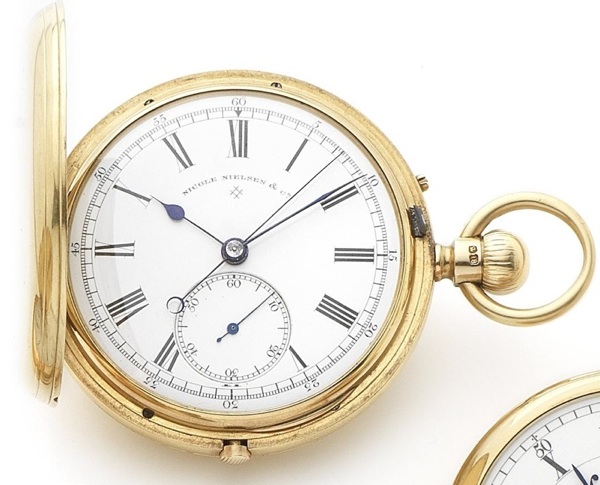 Nicole Nielson Co. An 18ct gold keyless wind full hunter chronograph pocket watch Numbered 1198, London Hallmark for 1882