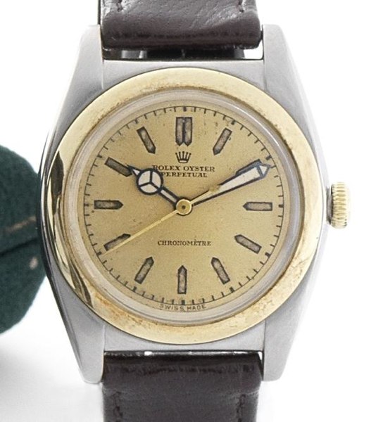 Rolex. A fine stainless steel and gold automatic centre seconds wristwatch Oyster Perpetual, Ref:3133, Case No.57037, Circa 1940