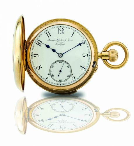 Manoah Rhodes Sons, Bradford. An 18ct gold half hunter quarter repeating keyless wind pocket watch