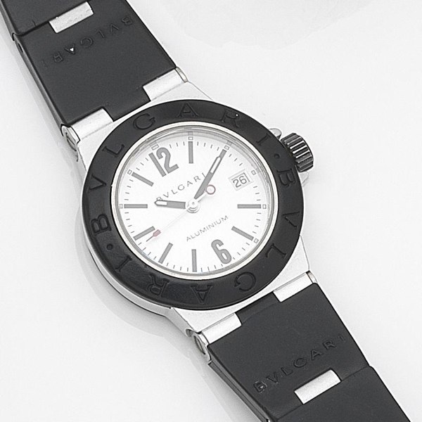 Bulgari. A lady's aluminium and rubber quartz calendar bracelet watch