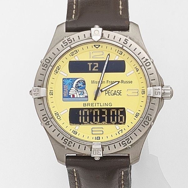 Breitling. A titanium quartz minute repeating chronograph wristwatch with digital display