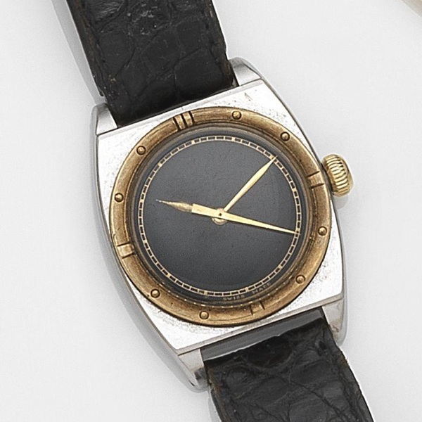 Rolex. A stainless steel and gilt manual wind wristwatch