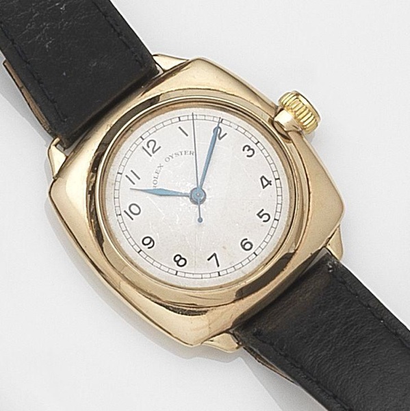 Rolex. A 9ct gold manual wind wristwatch