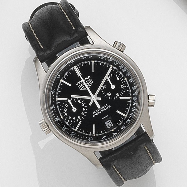 Heuer. A stainless steel automatic calendar chronograph wristwatch with box and papers