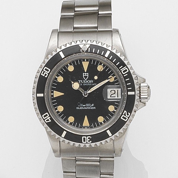 Tudor. A stainless steel automatic calendar bracelet watch