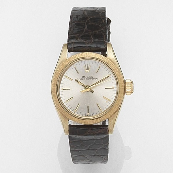 Rolex. A lady's 9ct gold automatic centre seconds wristwatch