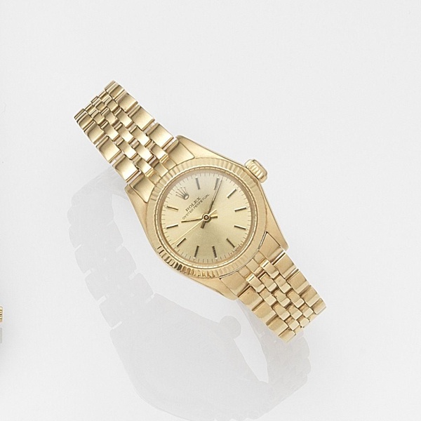 Rolex. A lady's 18ct gold automatic centre seconds bracelet watch