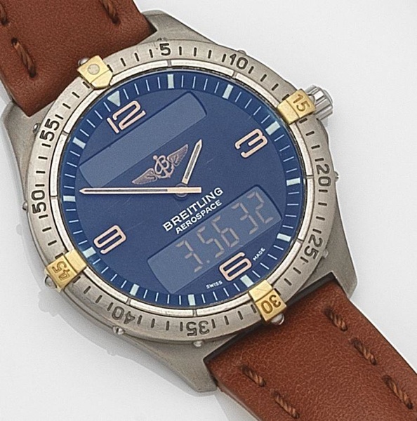 Breitling. A titanium quartz multi-function wristwatch with box and papers